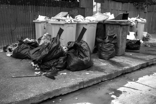Construction workers removing waste from a building site in Hackbridge